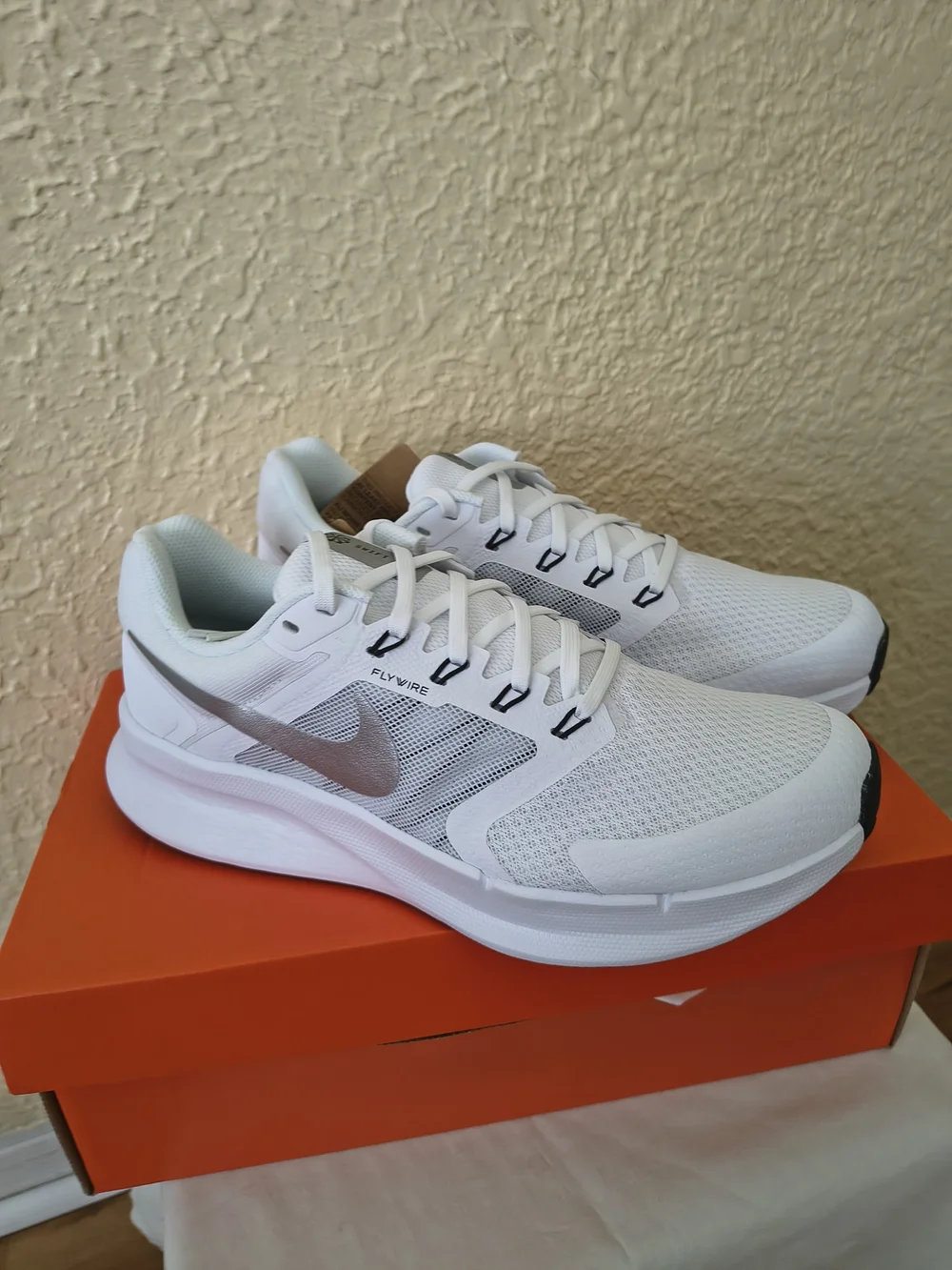 Nike Women’s White Sneakers with Silver Swoosh